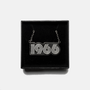 Necklace with '1966' design in a black box on a white background