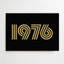 Black greetings card with 1976 printed in gold

