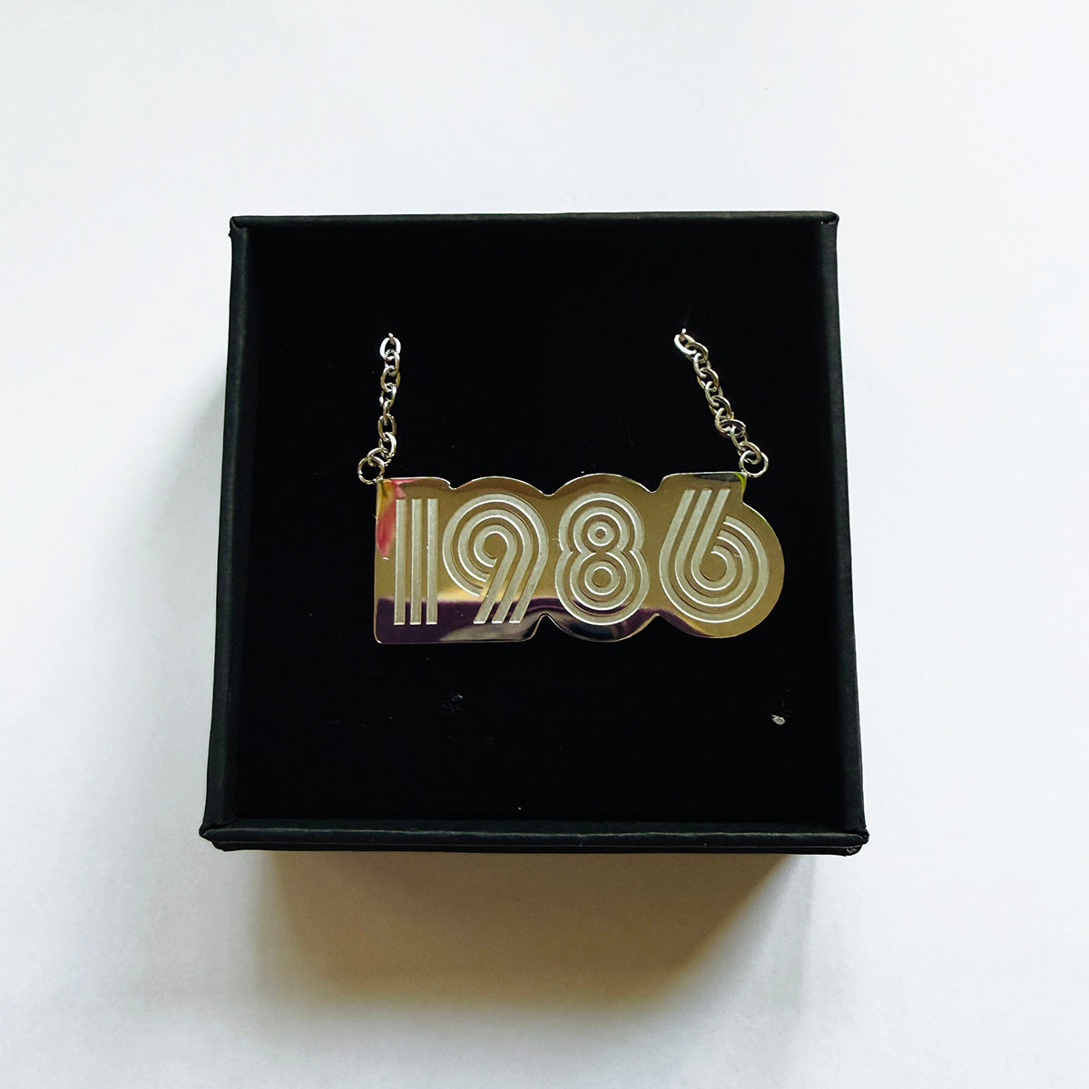 Necklace with '1986' design in silver - disko kids