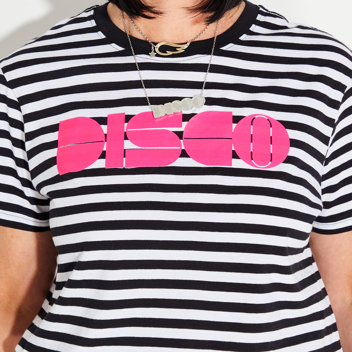Womens black and white striped t-shirt with pink 'DISCO' print - Disko Kids
