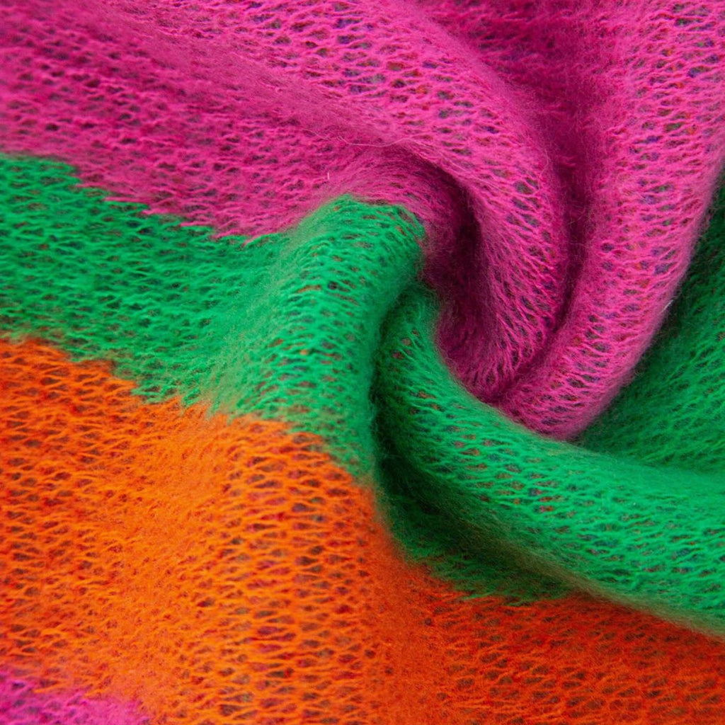 Colorful wavy rainbow scarf on a white background