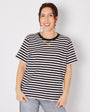 Woman wearing a black and white striped t-shirt against a plain background donna tshirt disko kids