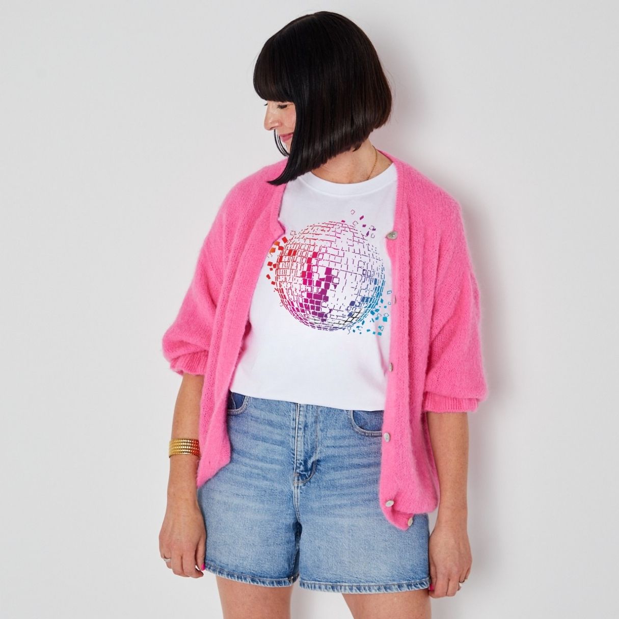 disco down mirrorball donna tshirt styled with pink cardigan and denim shorts festivak style disko kids