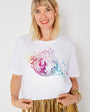 rainbow print disco ball on a white donna tshits disco down with gold skirt