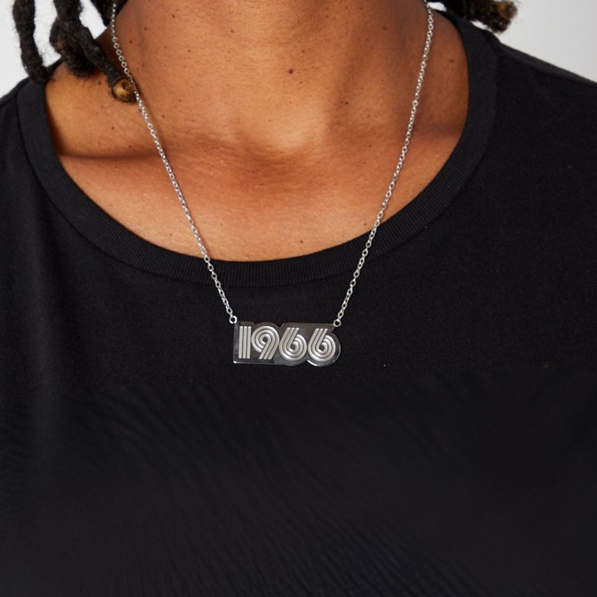Necklace with '1966' design in a black box on a white background disko kids 60th birthday gift