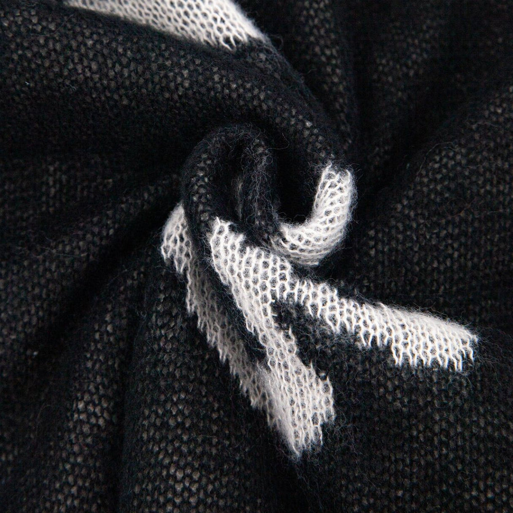 Black scarf with white heart patterns 