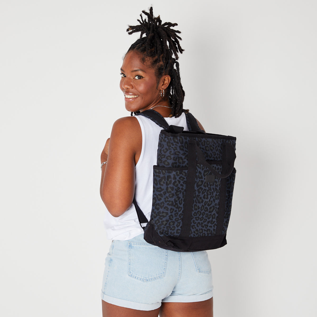 denim blue leopard fabric backpack