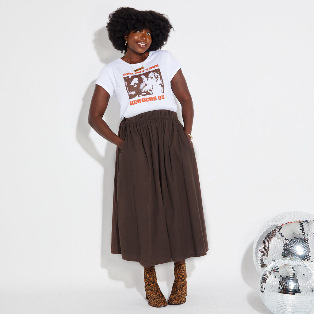white records on t-shirt with graphics by Disko Kids and a chocolate brown A line midi skirt