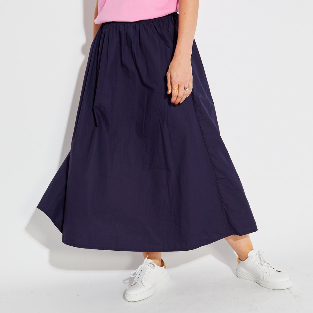 Disko Kids Navy blue A line skirt with white trainers