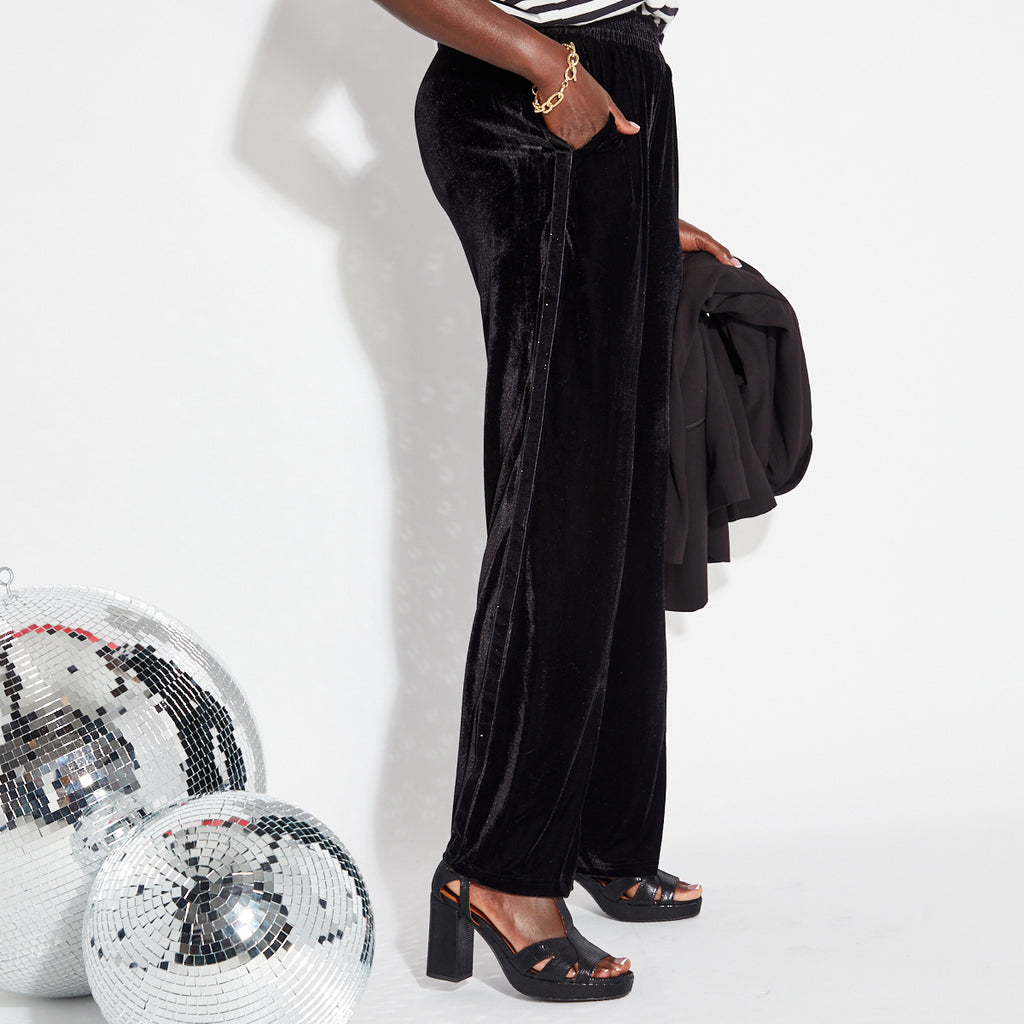 Elasticated black velvet trousers
