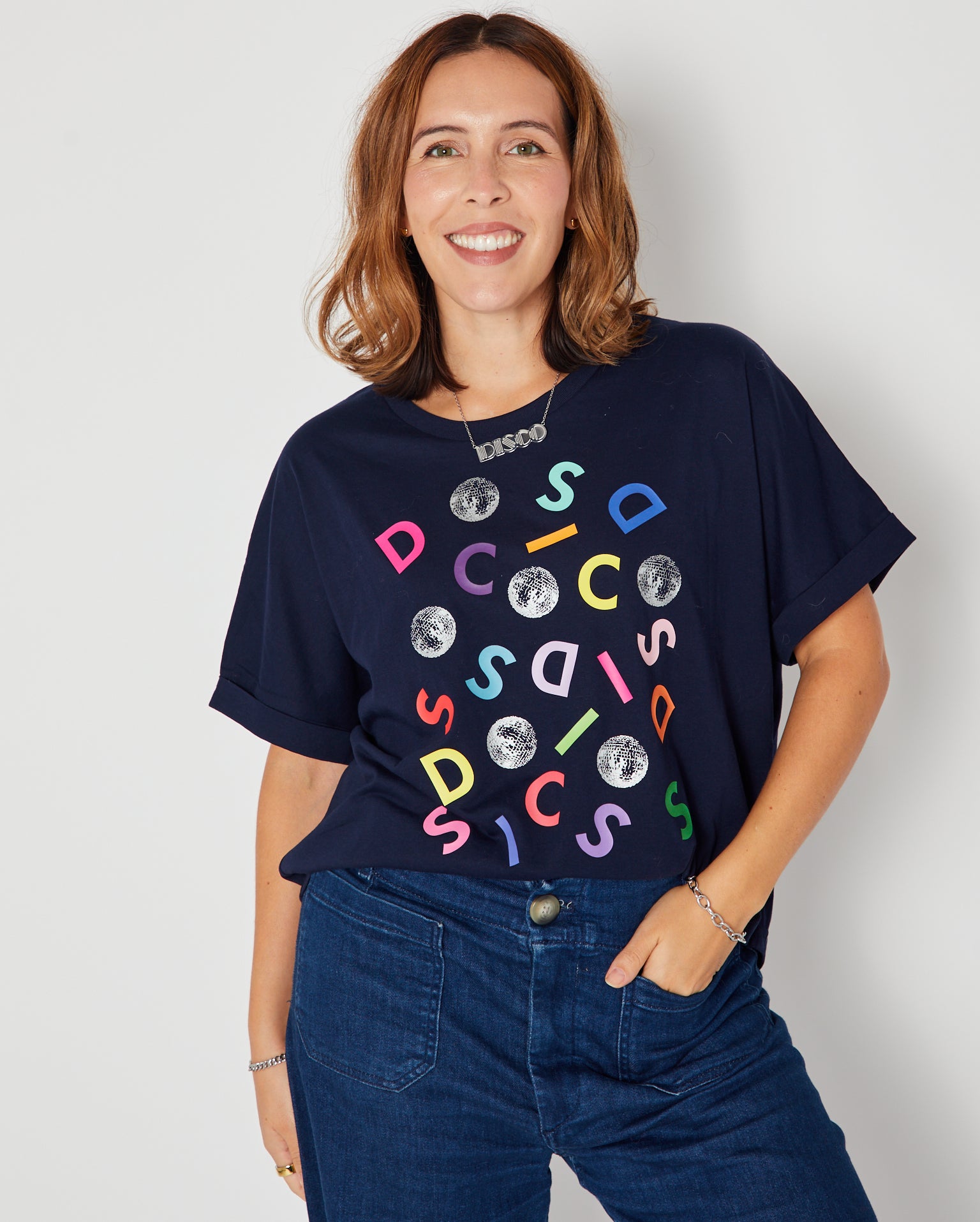 Disco Confetti Aretha Tshirt Navy tucked into jeans boxy fit