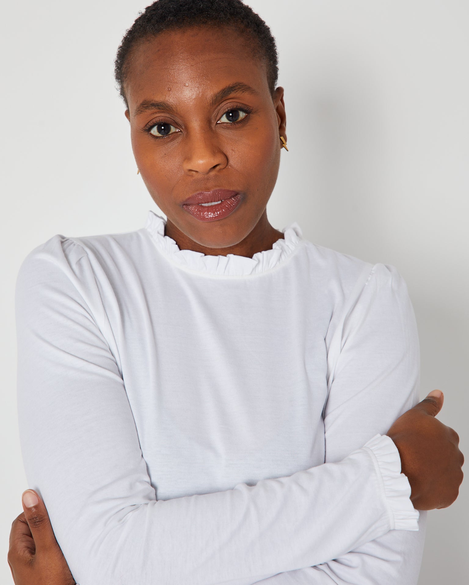 Bonnie Long Sleeve Ruffle Edge Top White showing collar and cuff