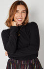 Bonnie Long Sleeve Ruffle Edge Top Black showing cuff and top of skirt disko kids layering piece