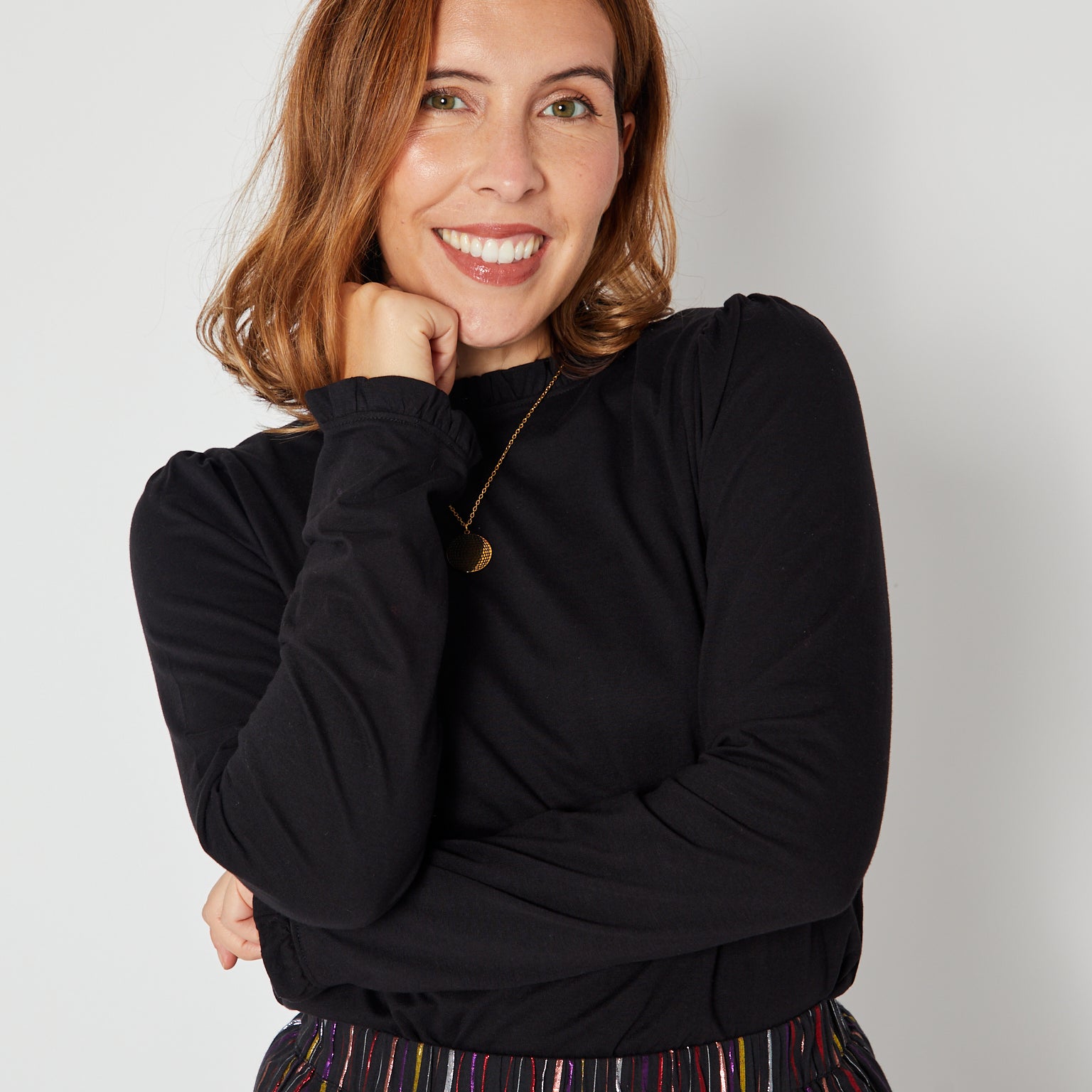 Bonnie Long Sleeve Ruffle Edge Top Black showing cuff and top of skirt disko kids layering piece