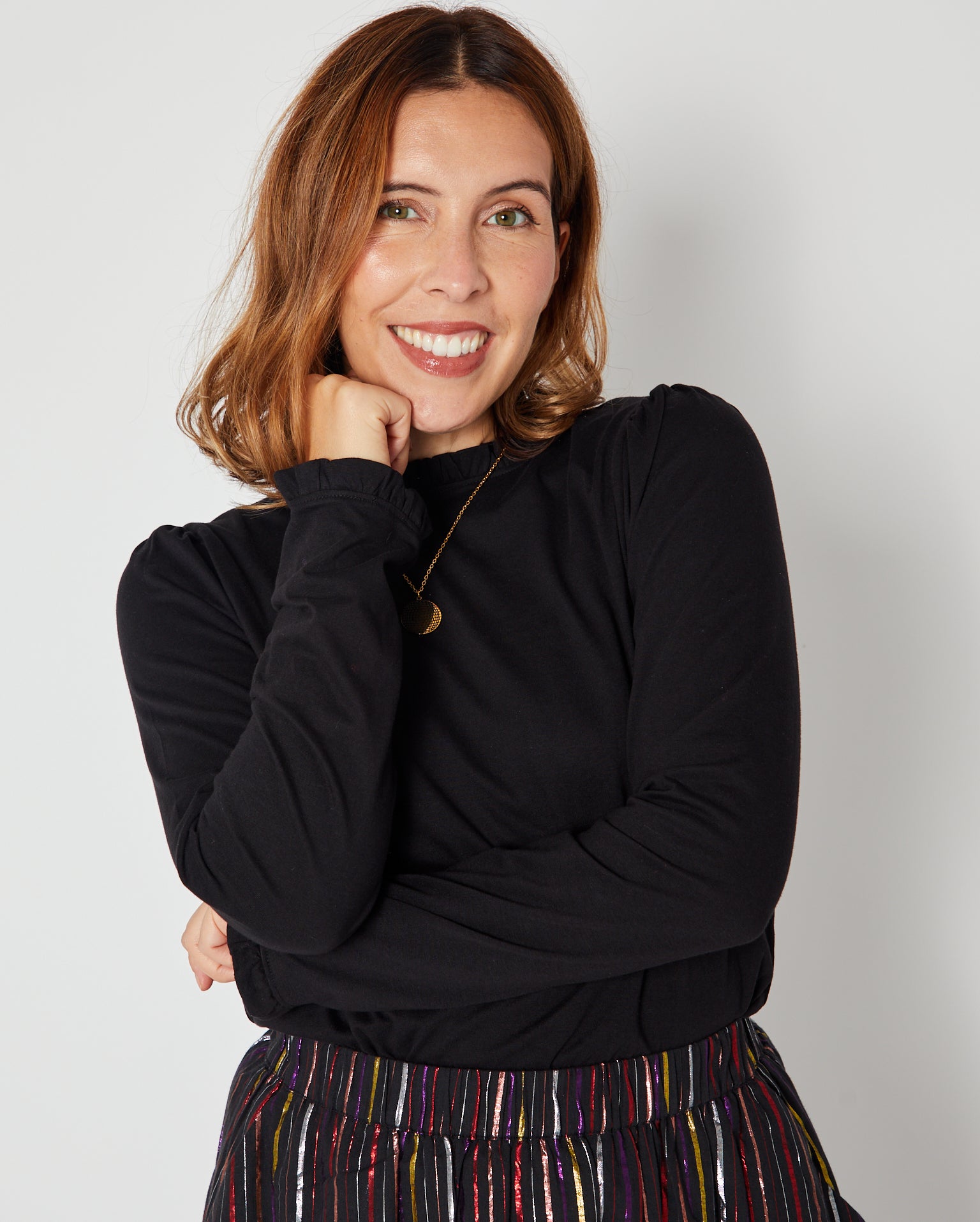Bonnie Long Sleeve Ruffle Edge Top Black showing cuff and top of skirt disko kids layering piece