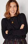 Bonnie Long Sleeve Ruffle Edge Top Black with disco ball oendant and rainbow skirt