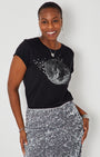 Black short-sleeve t-shirt with a silver disco ball graphic  paired with a silver sequined skirt.