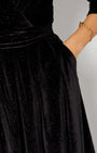 close up of the pocket of Black Rainbow Sparkle Jumpsuit and DISCO bracelet