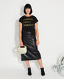 Womens black t-shirt with 'HALSTON GUCCI FIORUCCIO' gold text - Disko Kids