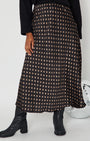 Polka Dot Satin Skirt black and gold close up with boots