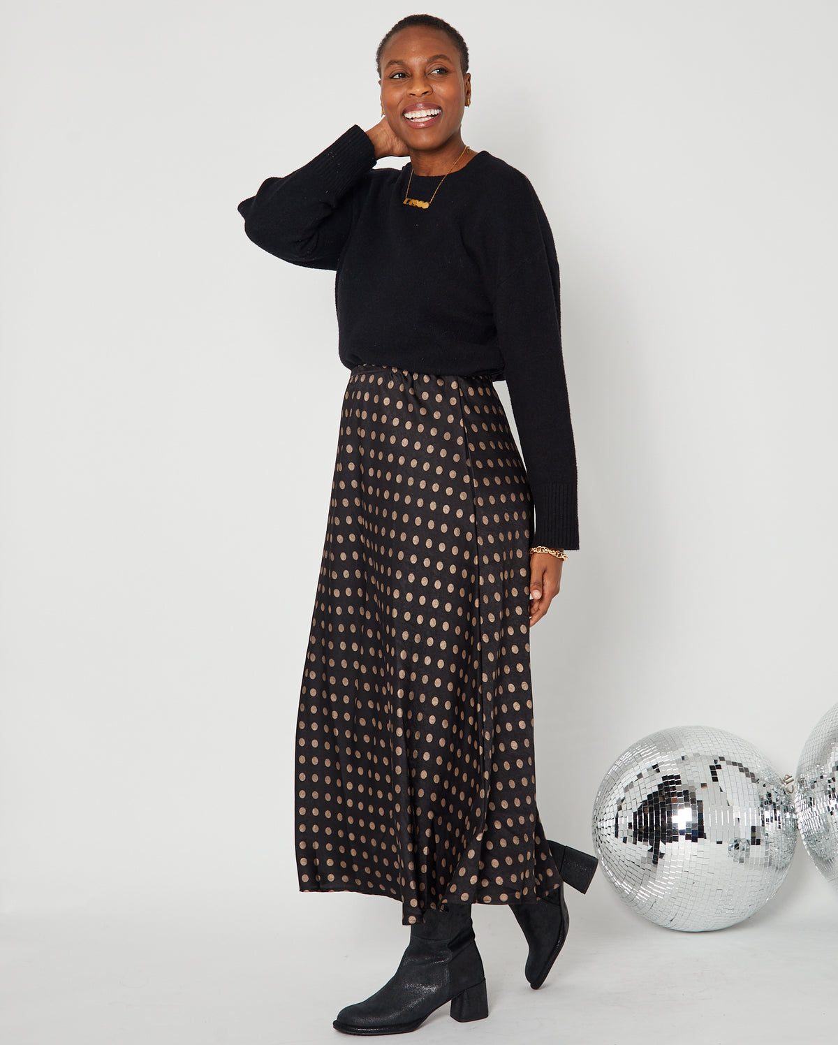 Polka Dot Satin Skirt styled with a knit and a DISCO necklace