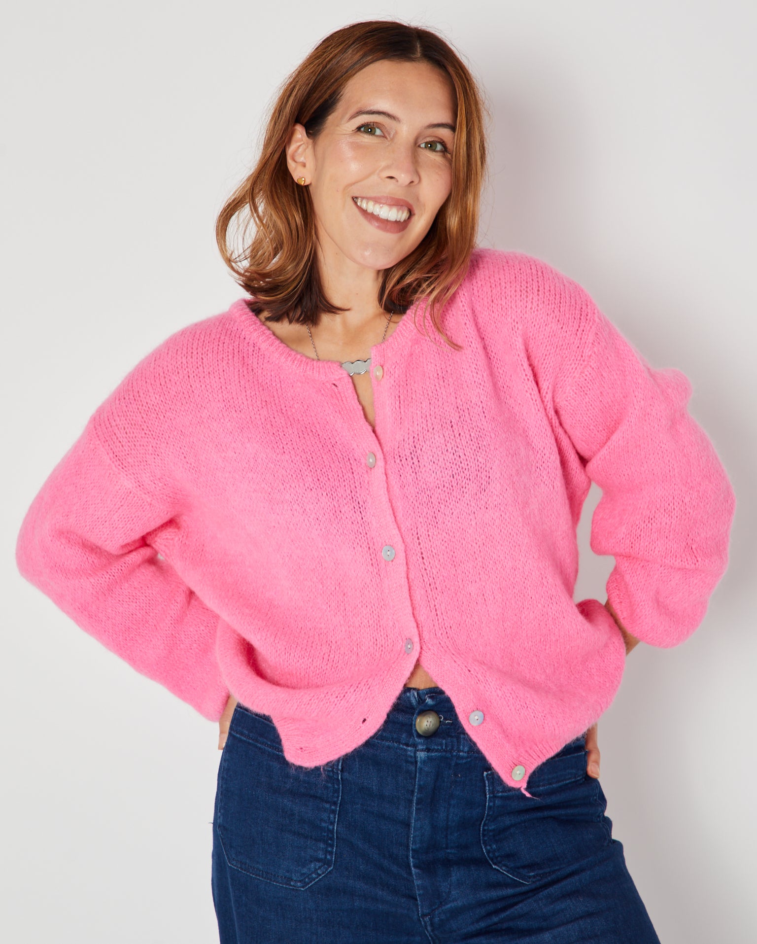 Pink Round Neck Cardigan with sleeves down semi buttoned