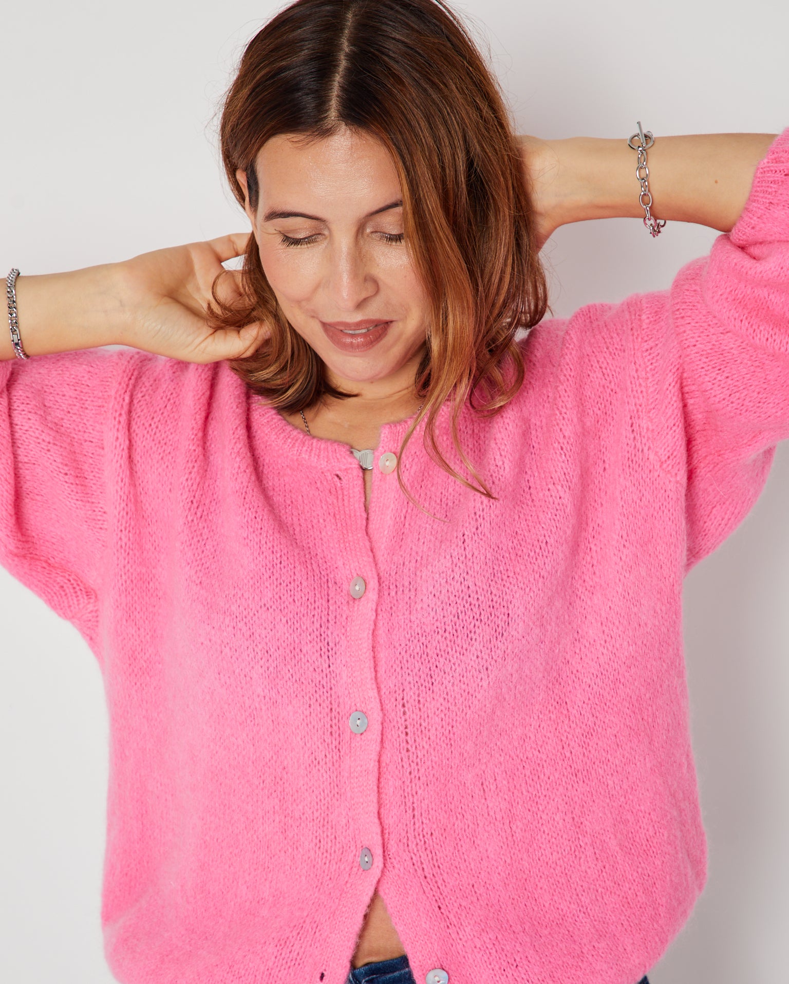 Pink Round Neck Cardigan close up buttoned up