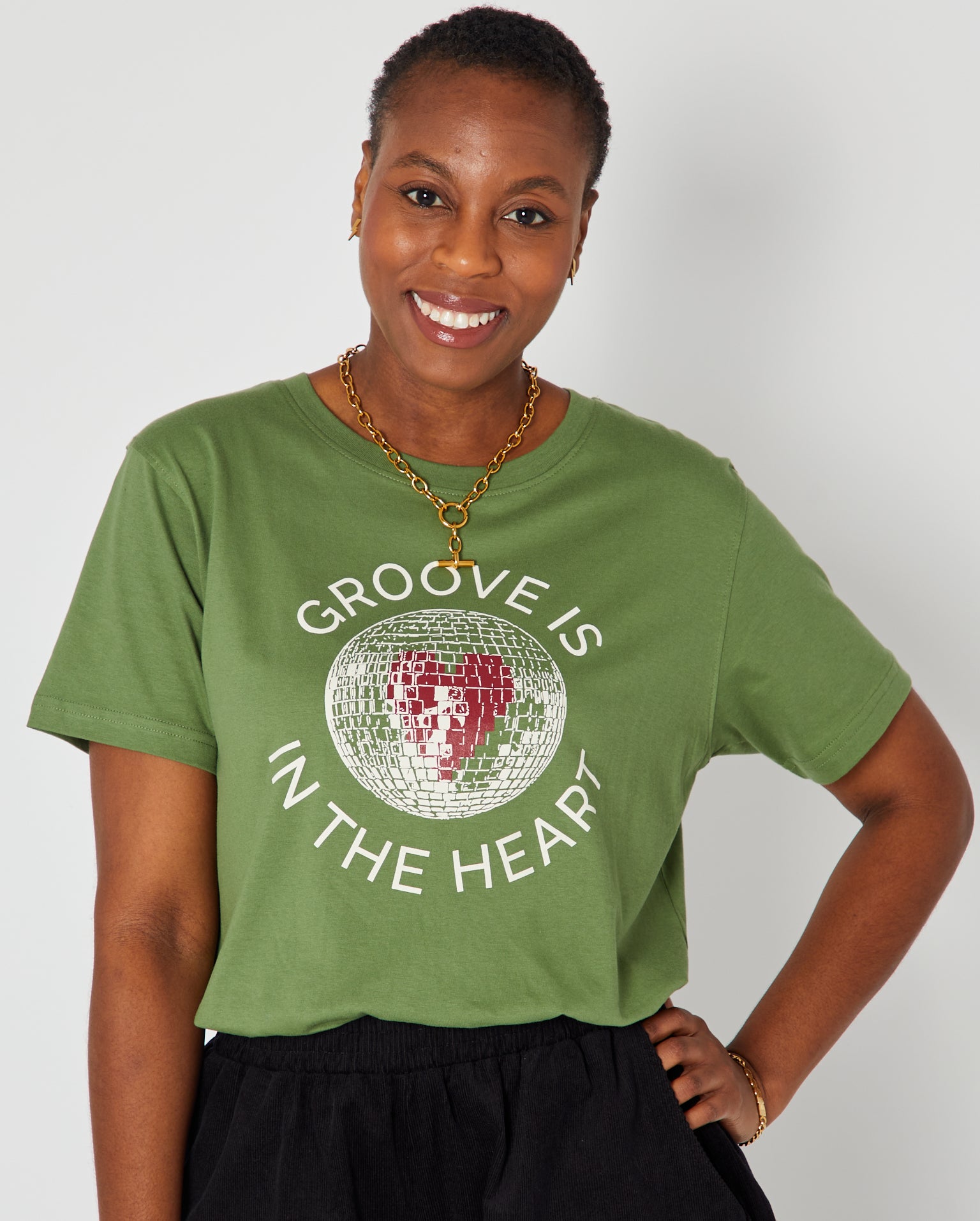 Disko kids groove is in the heart graphic tshirt disco ball design in olive green