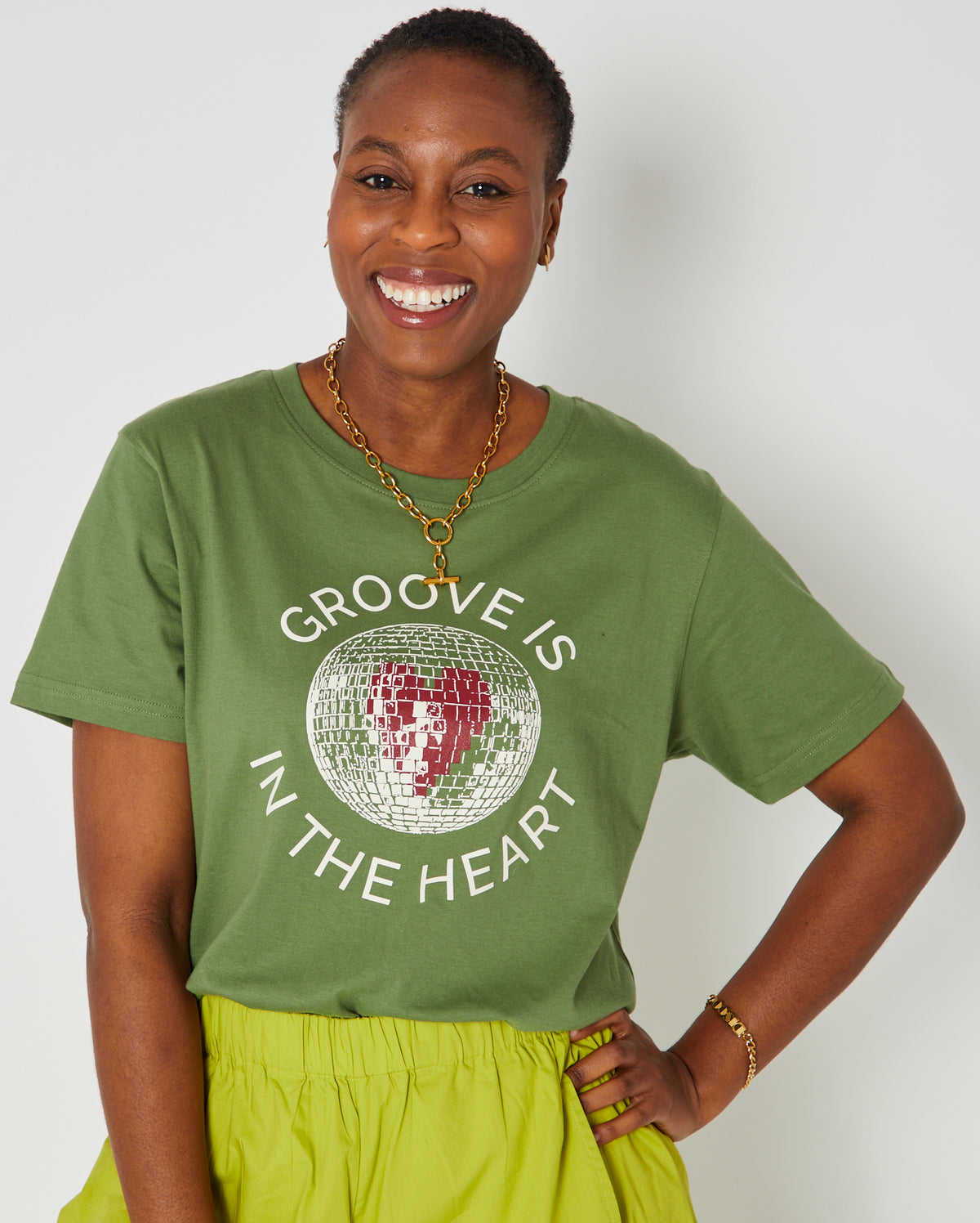 groove is in the heart graphic tshirt styled with bright trousers
