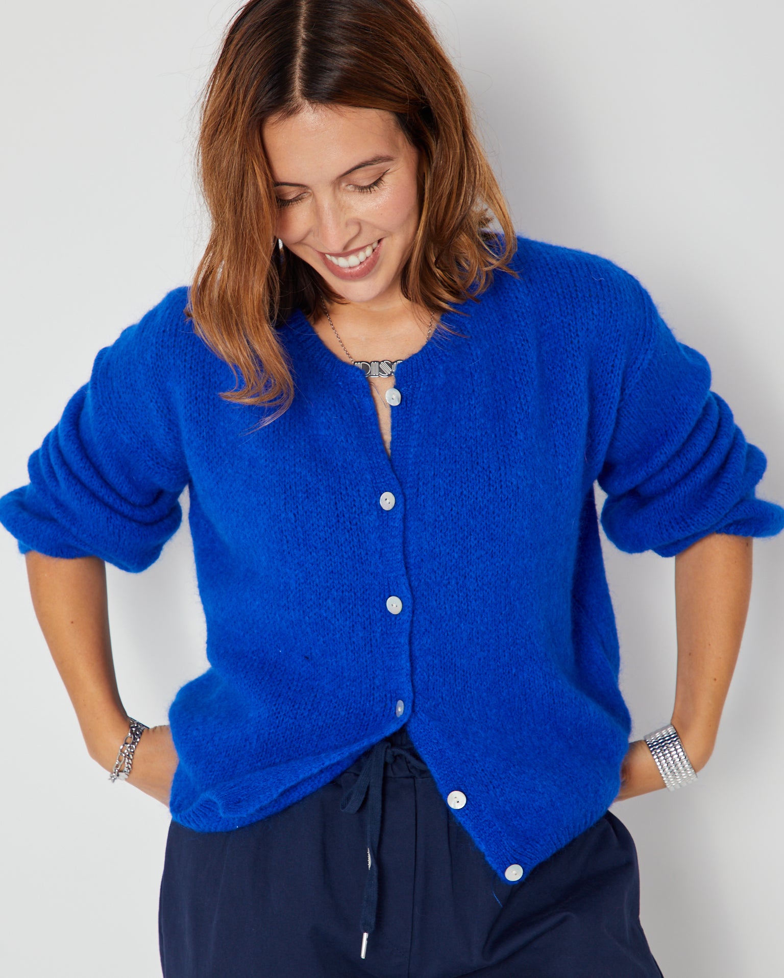 Royal Blue Round Neck Cardigan shown with disko kids blue drawstring trousers