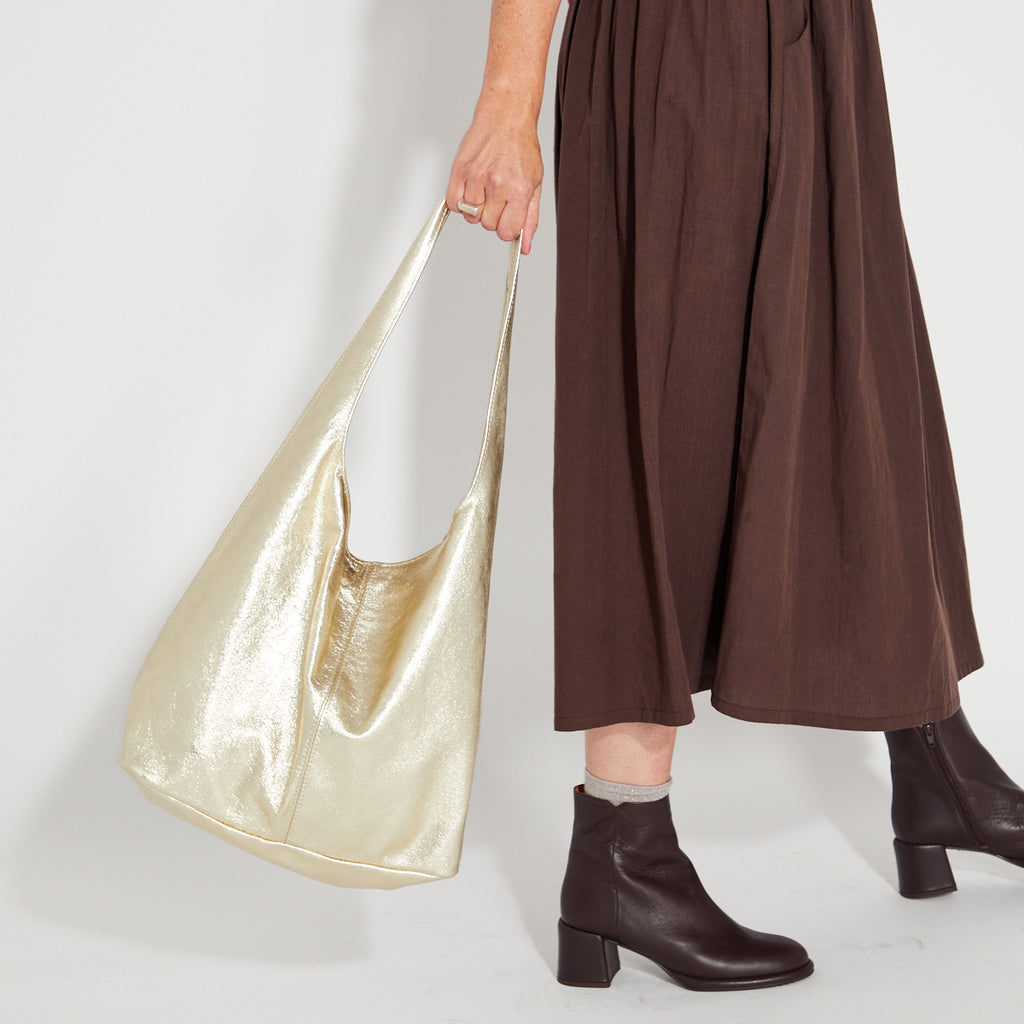 gold slouchy shoulder handbag