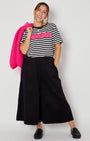 Disco Striped Donna Tshirt Pink styled with wide leg culottes and pink knit