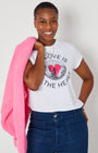 Groove Is In The Heart disco ball graphic tshirt disko kids styled with DISCO necklace and pink cardigan