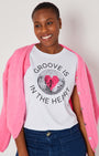 Groove Is In The Heart disco ball graphic tshirt disko kids styled with pink cardi