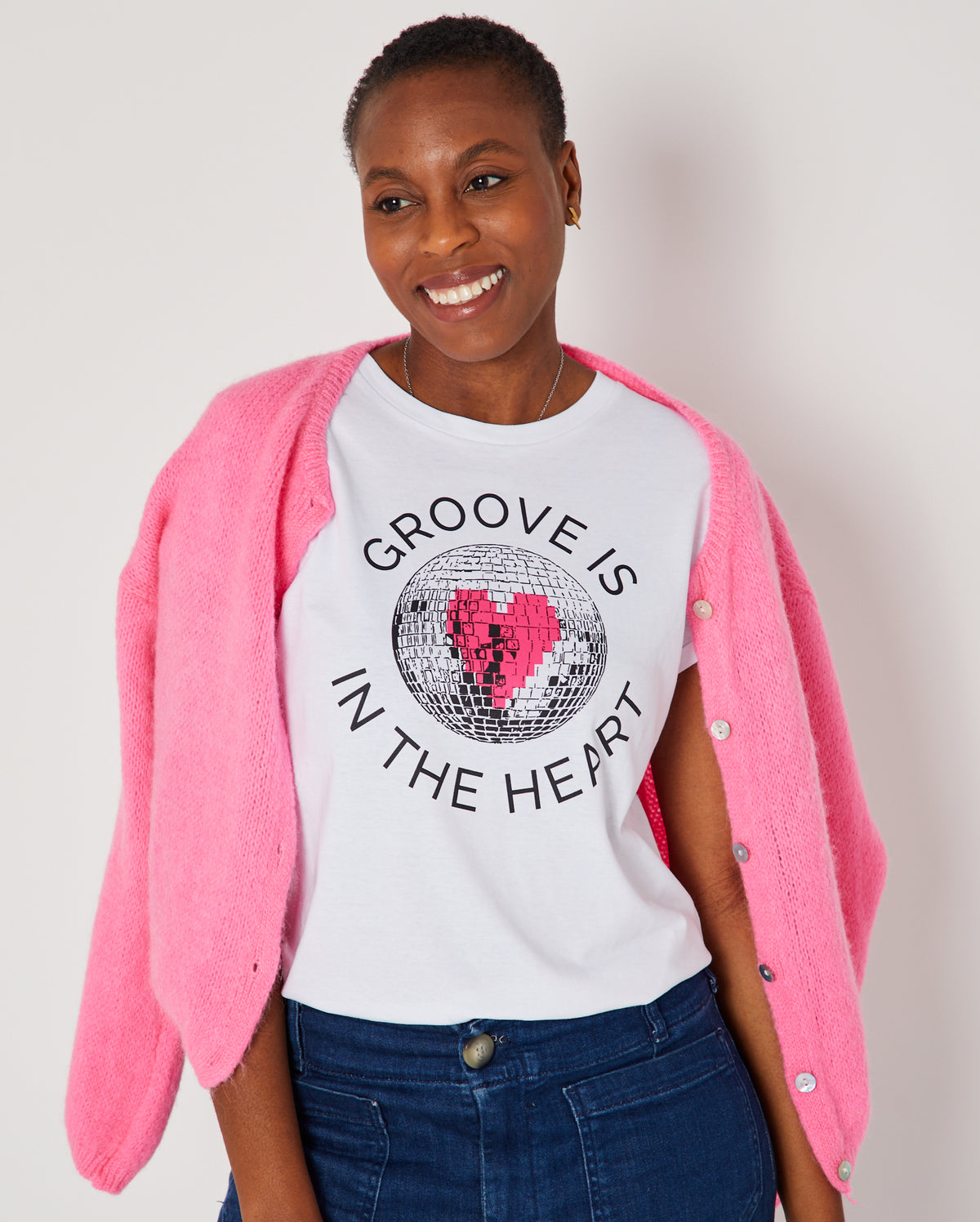 Groove Is In The Heart disco ball graphic tshirt disko kids styled with pink cardi