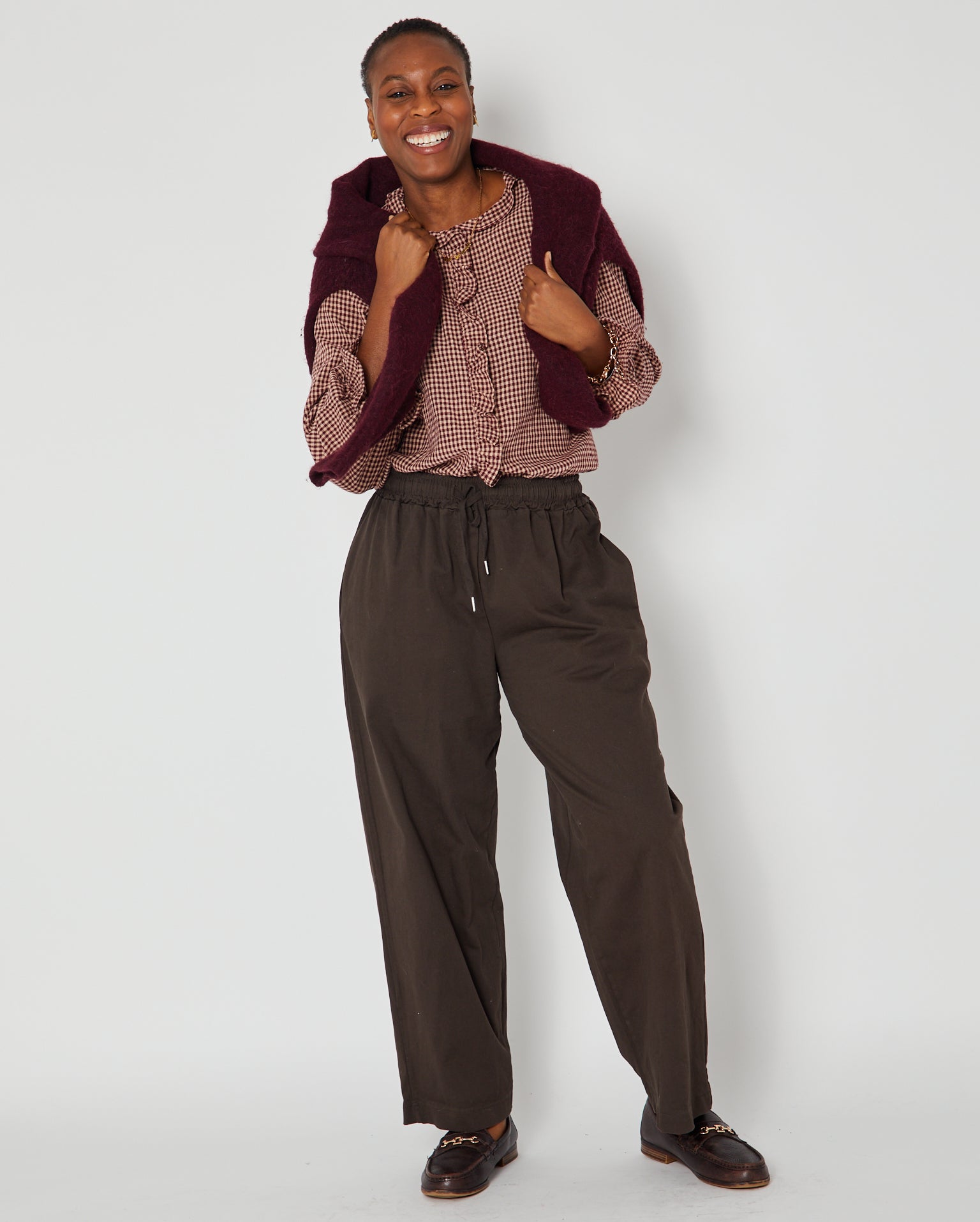 brown barrel leg trousers with elasticated waist shown with burgundy top disko kids