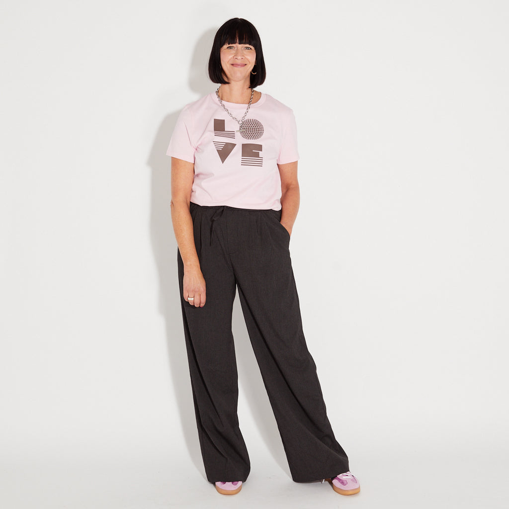 Dark Grey Striped Wide Leg Trousers and pink LOVE IS tshirt