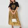 Gold metallic a line skirt full outfit styled with sequin Tshirt disko kids and party heels for christmas and party season