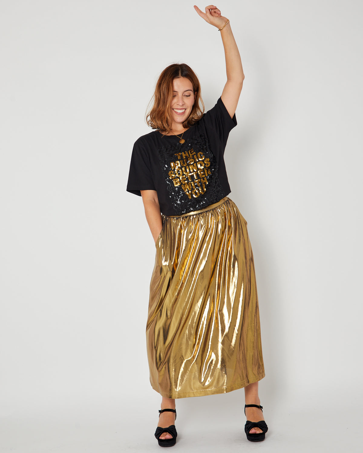 party shot of disko kids Gold metallic a line skirt and sequin music sounds better tshirt for partywear season