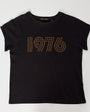 black tshirt with gold embellished 1976 on front