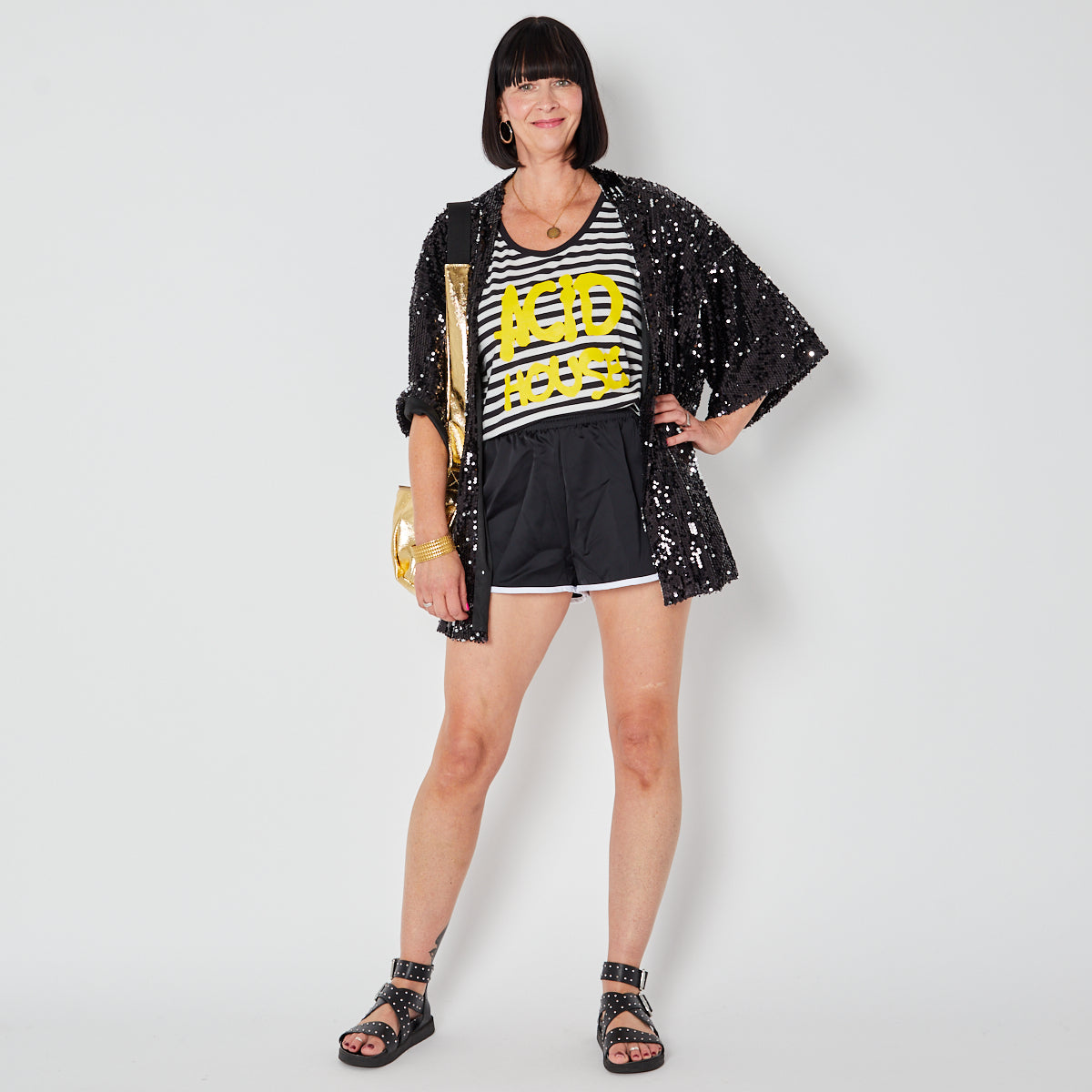 Black and white striped vest with yellow 'ACID HOUSE' text Festival outfit