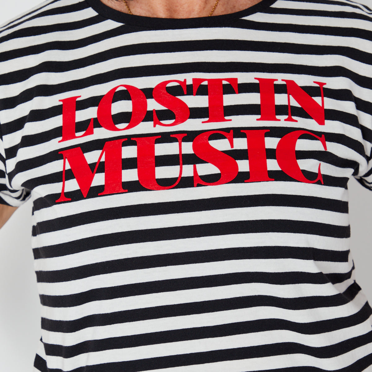 Black and white striped t-shirt with 'LOST IN MUSIC' text in red disko kids festival music inspired tshirts