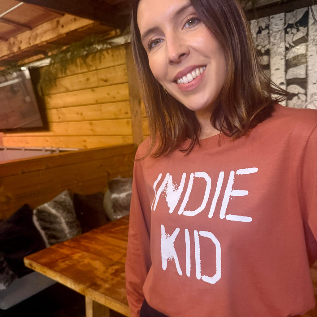Brown long-sleeve Tshirt with 'INDIE KID' white text on - Disko Kids
