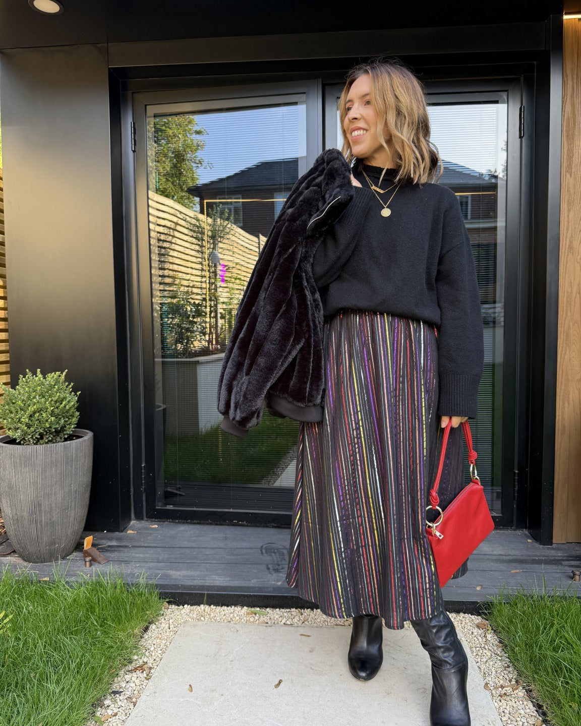 metallic rainbow skirt and red cardigan - christmas outfit