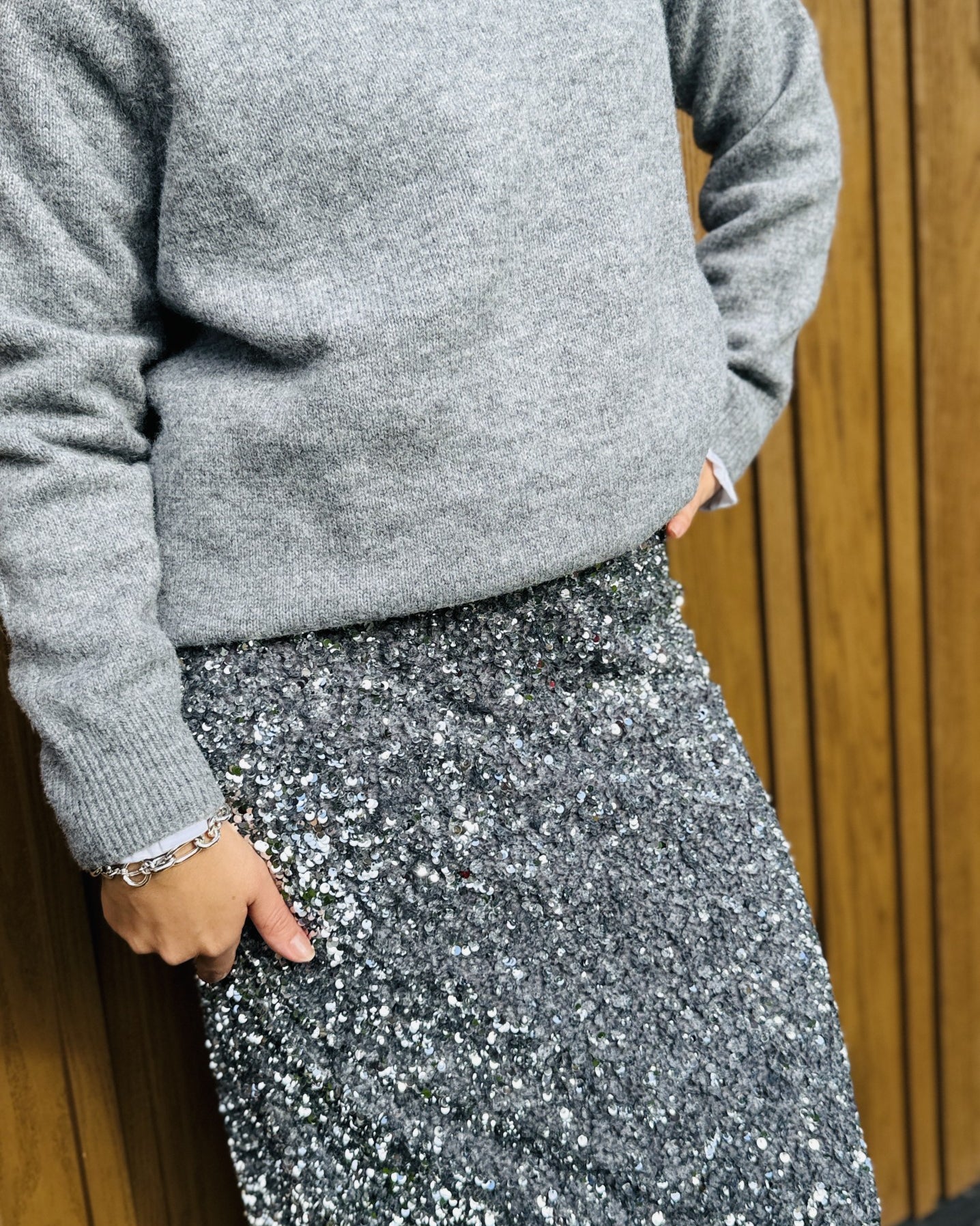 close up of silver sequin skirt