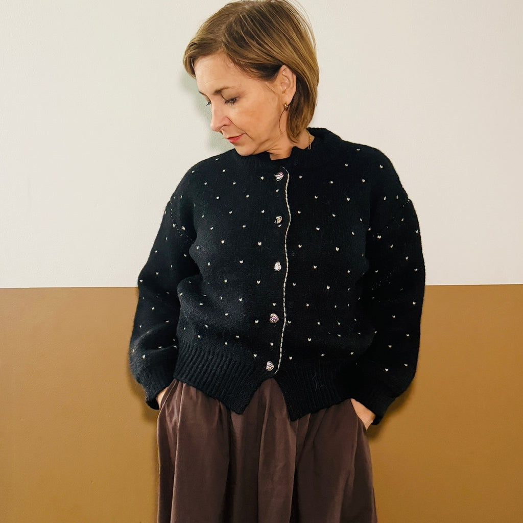 black cardigan with white hearts and silver buttons disko kids