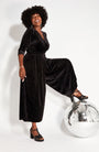 Black Rainbow Sparkle Jumpsuit for party season and christmas full look with heels and disco ball disko kids