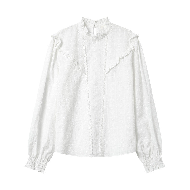 White blouse with lace details on a white background